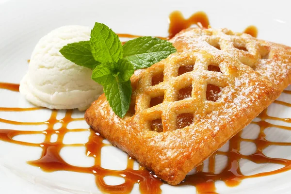 Little apricot pies with ice cream — Stock Photo, Image