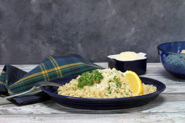 Cauliflower Rice Sprinkled Parmesan Garnished Parsley Wedge Lemon Table Setting — Stock Photo, Image