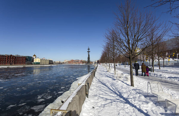 MOSCOW, RUSSIA MARCH 18, 2018: Moskow (Moskva) River embankment and the Piter the Thirst Monument, Russia (winter day) -- It was designed by the Georgian designer Zurab Tsereteli and was erected in 1997
