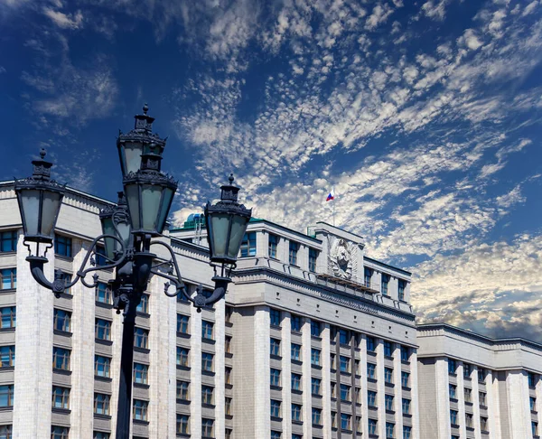 Building of The State Duma of the Federal Assembly of Russian Federation on a cloud background, Moscow, Russia