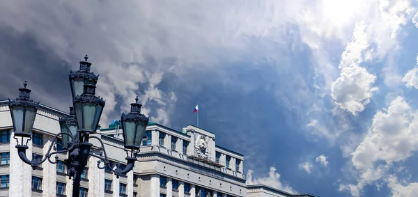 Building of The State Duma of the Federal Assembly of Russian Federation on a cloud background, Moscow, Russia