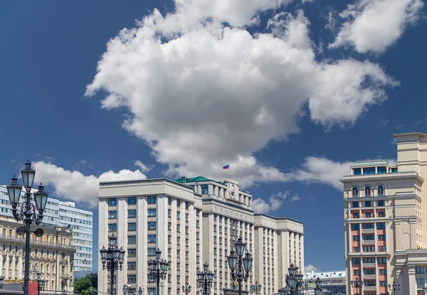 Building of The State Duma of the Federal Assembly of Russian Federation on a cloud background, Moscow, Russia