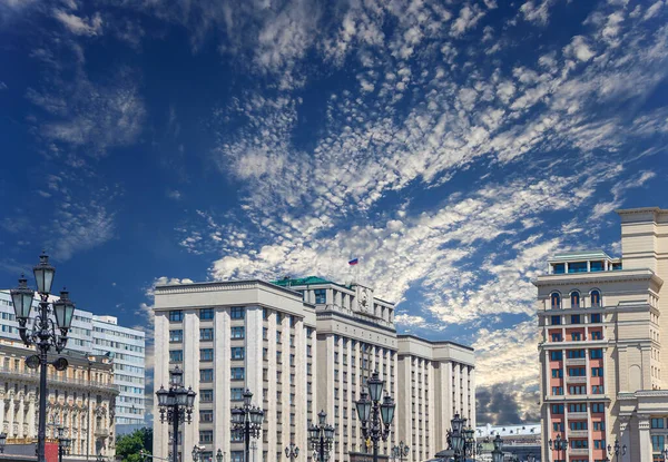 Building of The State Duma of the Federal Assembly of Russian Federation on a cloud background, Moscow, Russia