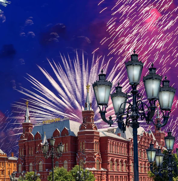 Fireworks over the Historical Museum during Victory Day (WWII). Red Square, Moscow, Russia. Historical Museum-- inscription in russian