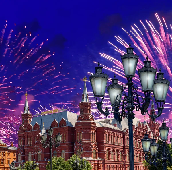 Fireworks over the Historical Museum during Victory Day (WWII). Red Square, Moscow, Russia. Historical Museum-- inscription in russian