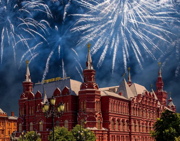 Fireworks over the Historical Museum during Victory Day (WWII). Red Square, Moscow, Russia. Historical Museum-- inscription in russian