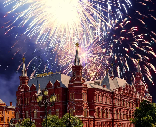 Fireworks over the Historical Museum during Victory Day (WWII). Red Square, Moscow, Russia. Historical Museum-- inscription in russian