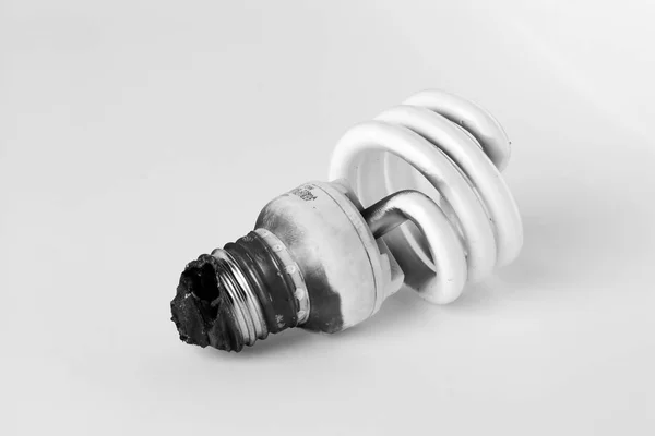 stock image Light Bulb Burned Isolated On White