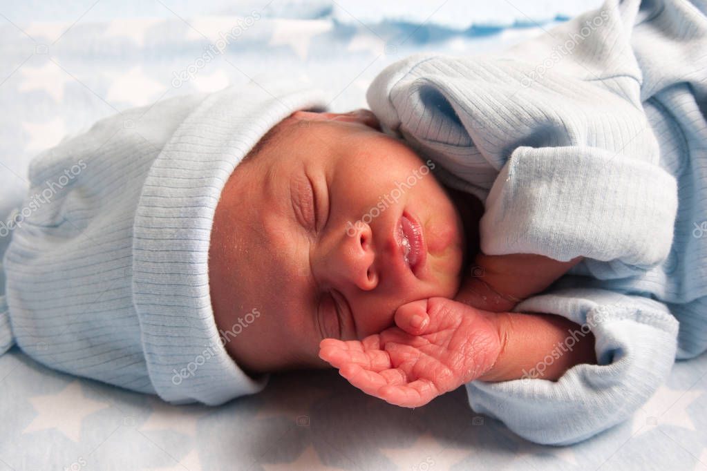 Portrait of a Sweet Newborn Baby Boy Sleeping