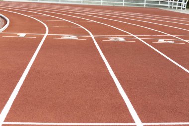 Spor alanında, parça arka plan kırmızı koşu parkuru