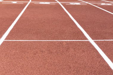 Spor alanında, parça arka plan kırmızı koşu parkuru