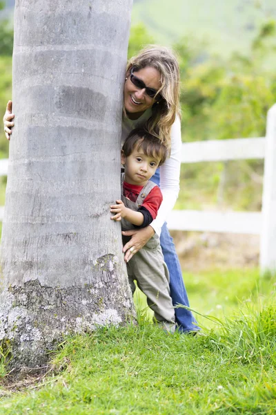Happy Mother Boy Hugging Tree Enjoying Tree — Stock Photo, Image