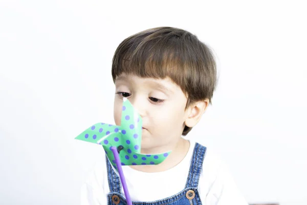 Happy Boy Playing with Pinwheel — Stock Photo, Image