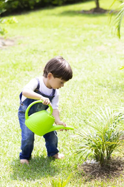 Happy Boy Watering Plants — Stock Photo, Image