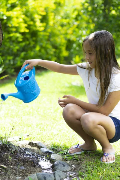 Happy Girl Watering Plants — Stock Photo, Image