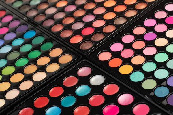 Makeaup sfondo di colorate tavolozze ombretto — Foto Stock