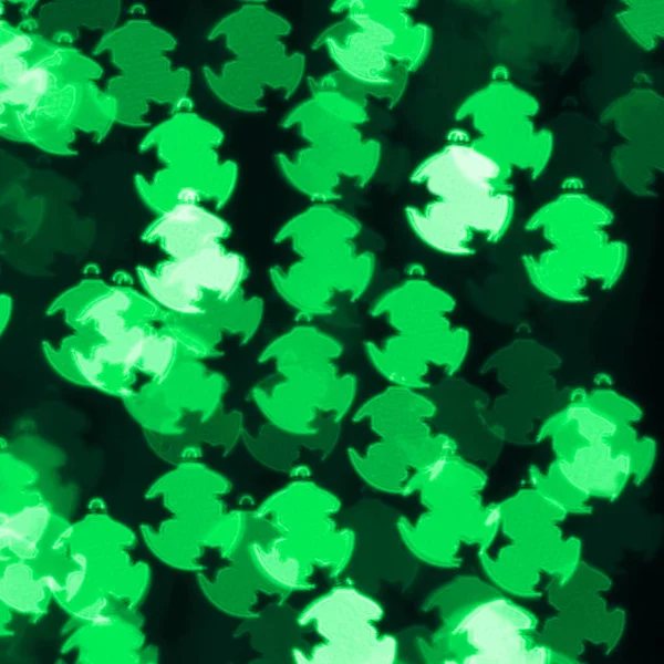 Defocused bokeh background with green Christmas decoration balls — Stock Photo, Image