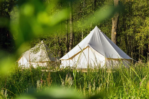 Camping canvas bell tents outdoors