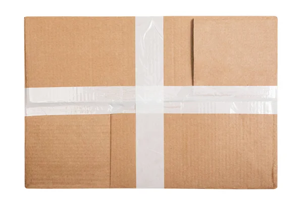 Cardboard box with white sticky tape isolated on white background — Stock Photo, Image