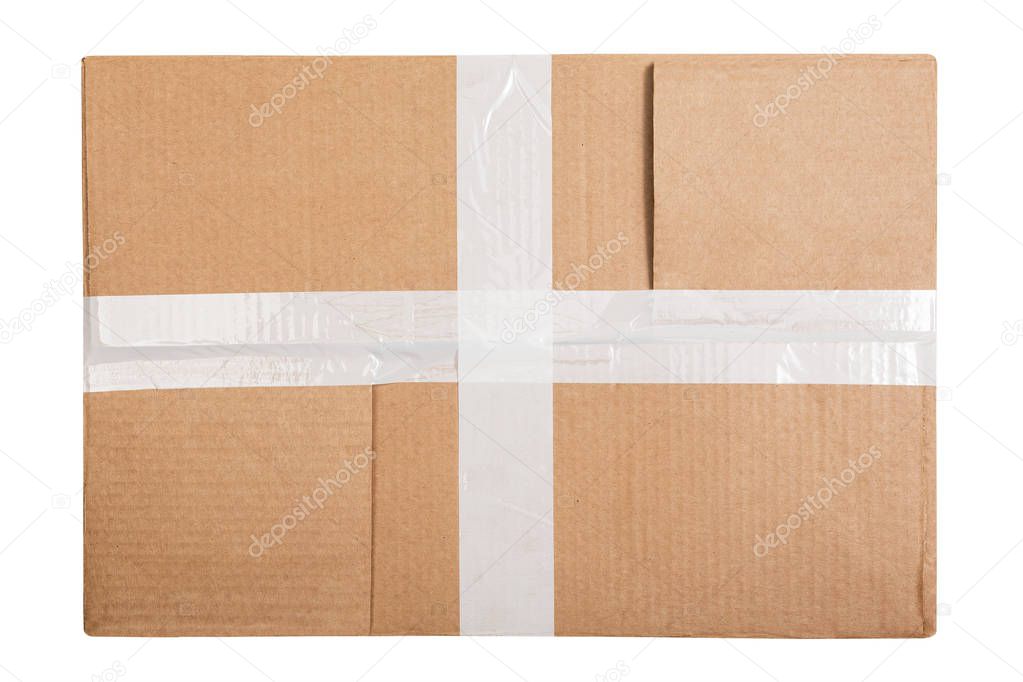 Cardboard box with white sticky tape isolated on white background