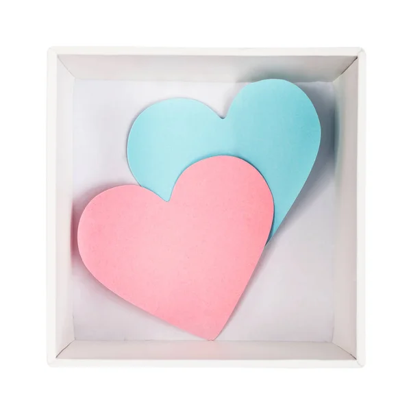 Paper hearts in white cardboard box isolated on white background. Flat lay — Stock Photo, Image