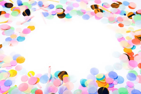 Close-up of colorful confetti as a border frame — Stock Photo, Image