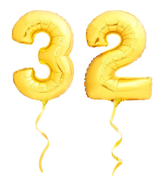 Golden number 31 thirty two made of inflatable balloon with ribbon on white