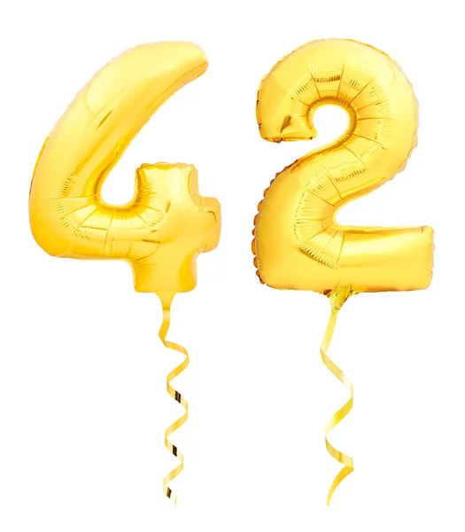 Número dourado quarenta e dois 42 feitos de balão inflável com fita em branco — Fotografia de Stock