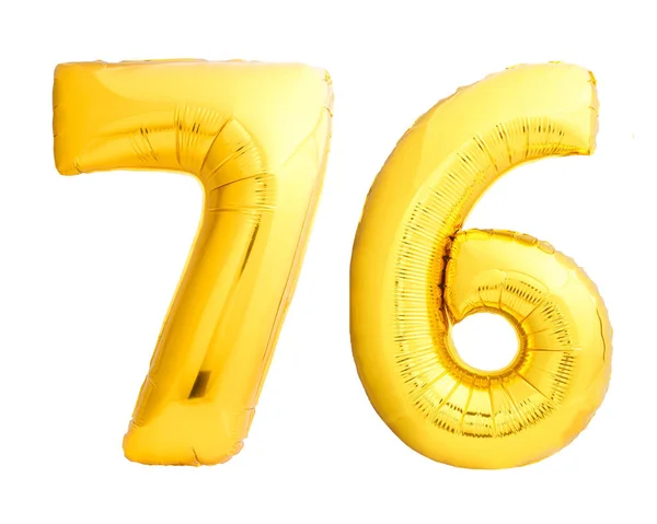 Goldene Zahl 76 sechsundsiebzig aus aufblasbarem Ballon — Stockfoto
