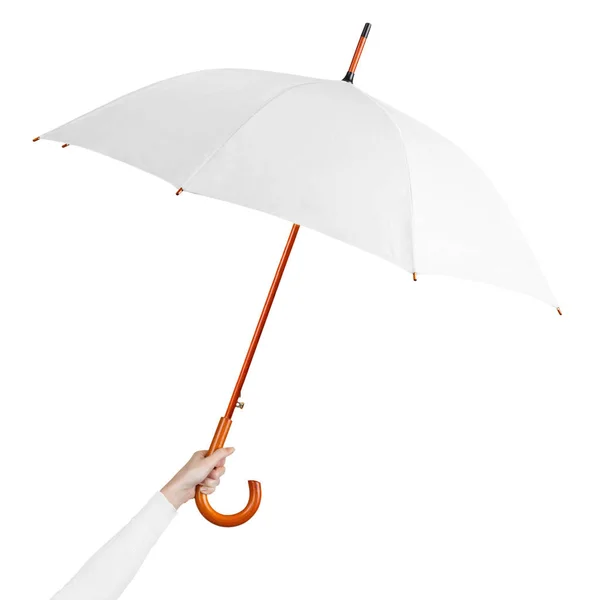Ręcznie trzymać biały parasol na białym tle. Kobieta ręka trzyma puste otwarte parasol — Zdjęcie stockowe