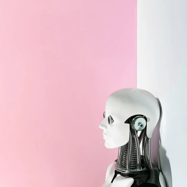 Robot head on abstract pink and white background