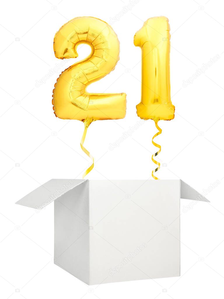 Golden number twenty one balloon flying out of blank white box isolated on white background