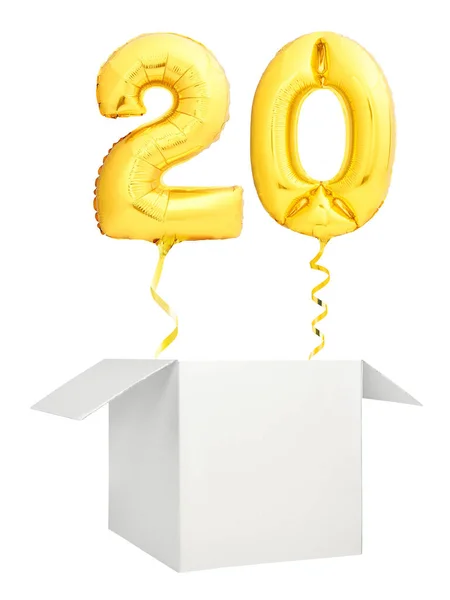 Golden number twenty balloon flying out of blank white box isolated on white background — Stock Photo, Image