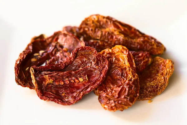 Sun Dried Tomato Halves White Plate Photographed Natural Light Selective — Stock Photo, Image