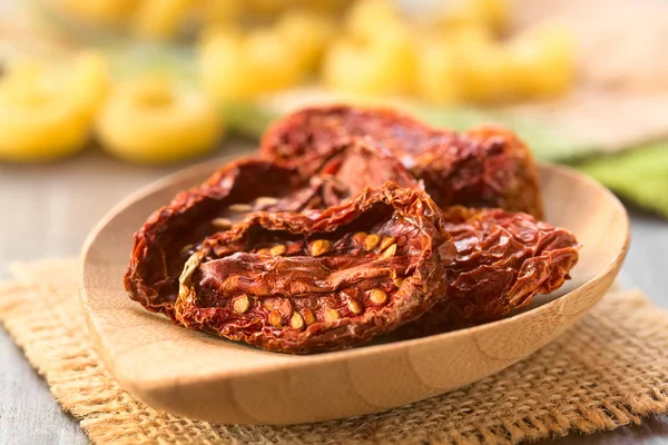Sun Dried Tomato Halves Bamboo Plate Raw Pasta Back Photographed — Stock Photo, Image