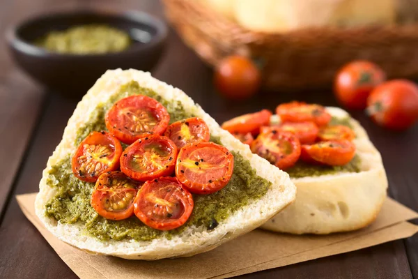 Olive Bread Roll Halves Spread Basil Pesto Topped Roasted Cherry — Stock Photo, Image