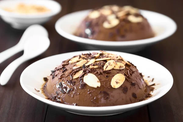 Chocolate Pudding Flan Caramel Sauce Roasted Almond Slices Chocolate Shavings — Stock Photo, Image