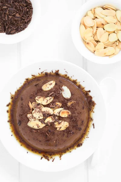 Chocolate Pudding Flan Dessert Caramel Sauce Roasted Almond Slices Chocolate — Stock Photo, Image