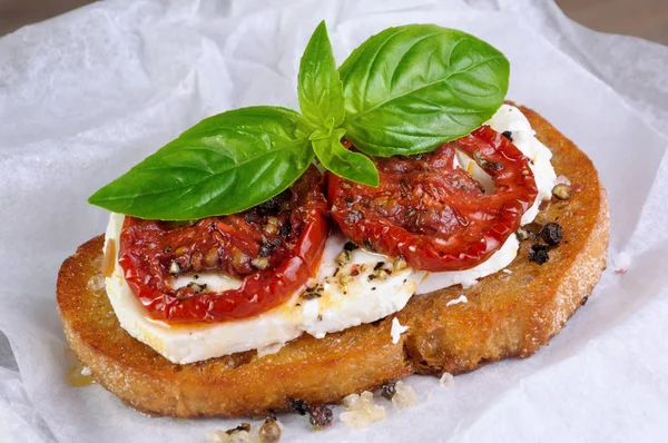 Bruschetta with feta and tomatoes — Stock Photo, Image