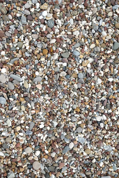 Fundo Muitas Pedras Seixos Lisas Pequenas Praia Mar Dia Ensolarado — Fotografia de Stock