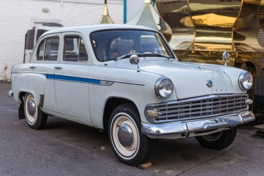 Kiev, Ukraine- May 04, 2019: An old retro car of the Moskvich brand stands on the street. clipart