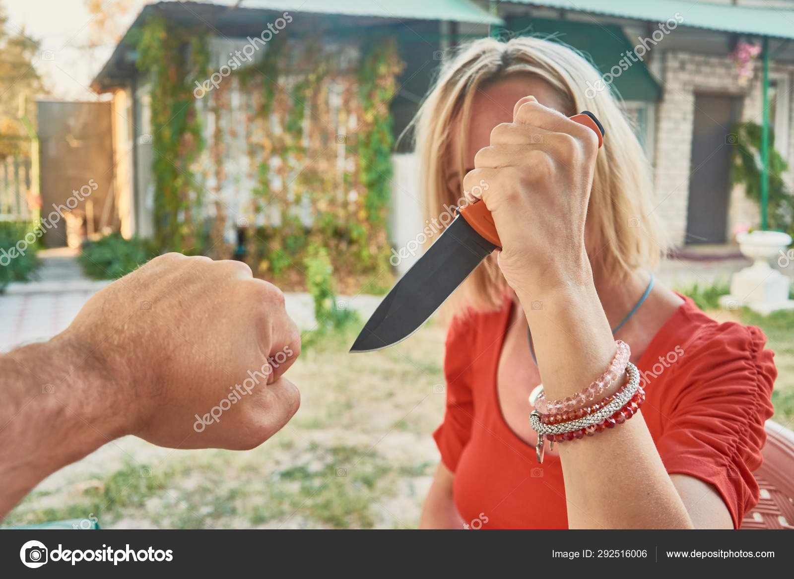 Woman With A Knife In Her Hand Against A Man Self Defense Attack Conflict With A Knife Aggression Concept Stock Photo C Nebasin Woman With A Knife In Her Hand Against A Man Self Defense Attack Conflict With A Knife Aggression Concept Stock Photo C Nebasin