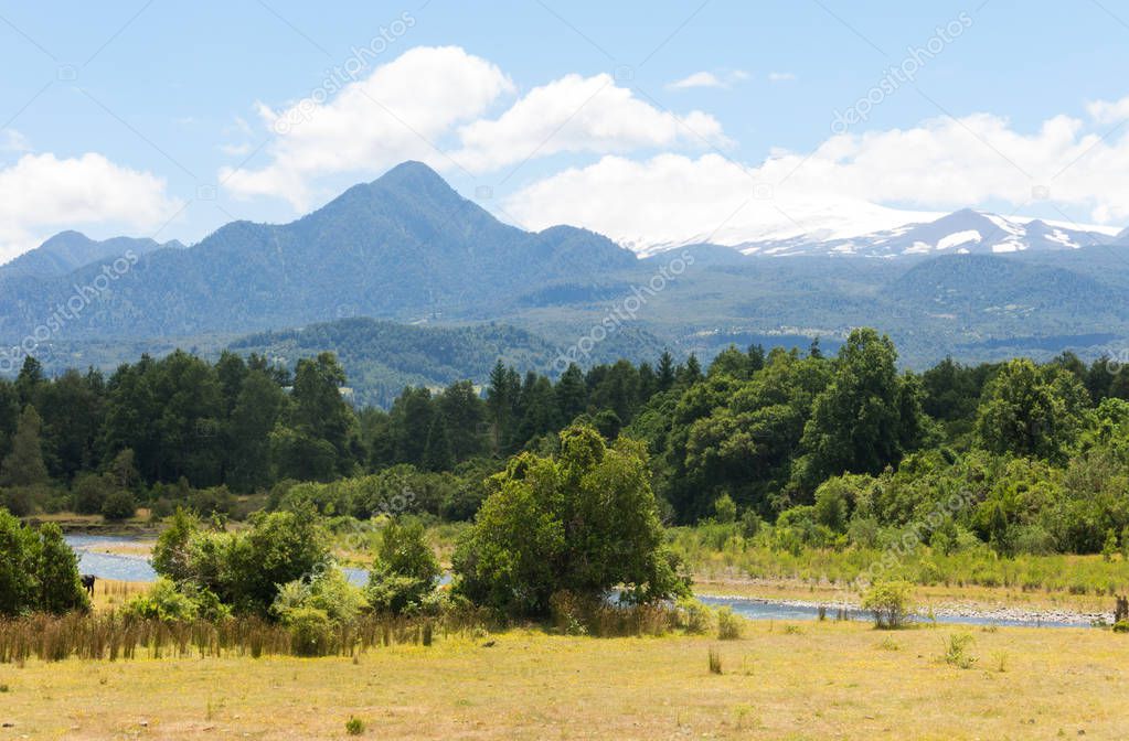 Panoramic Villarica National Park, in Conaripe, Panguipulli, with the Villarica volcano covered by the clouds. Los Rios Region, in Araucania or Patagonia, Chilean Andes.