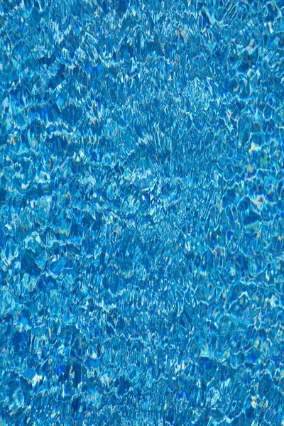 水の波紋のスイミング プールでテクスチャ — ストック写真
