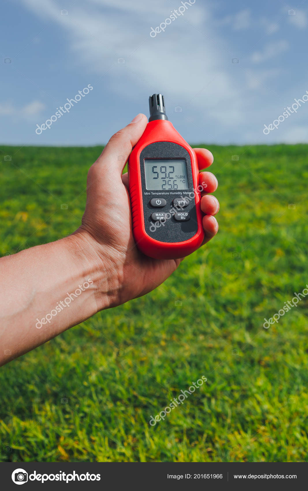 Portable Thermometer Hand Measuring Outdoor Air Temperature Humidity Stock  Photo by ©nikkytok 201651966