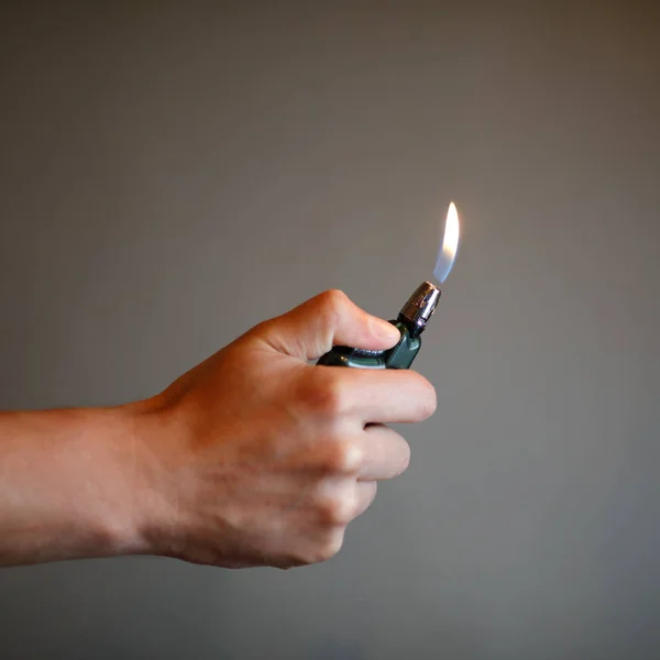 Cigarette Lighter Igniting Hand — Stock Photo, Image