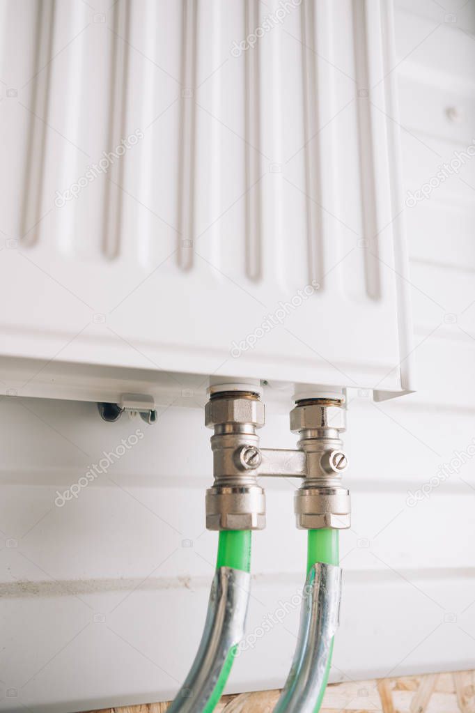 heating radiator with bottom connection pipes