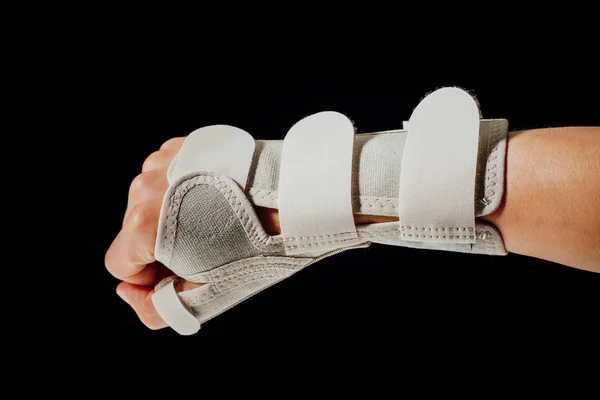 ブラックに分離 癒し手根管症候群の手首と手のインソール サポート — ストック写真