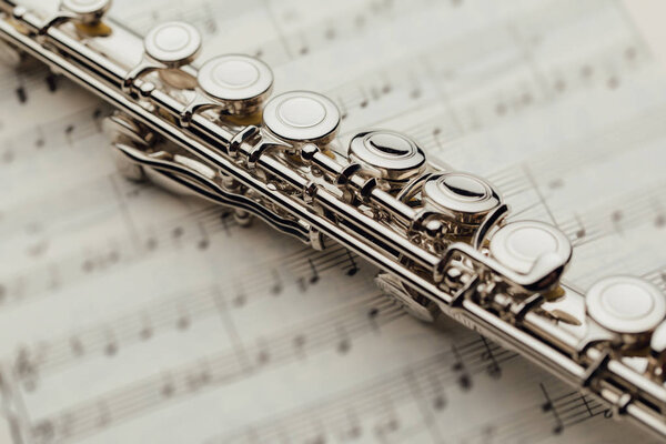 transverse flute on music sheet