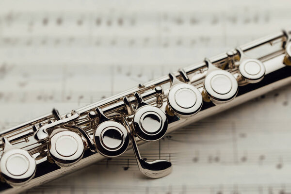 transverse flute on music sheet